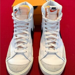 Nike Women’s White High-Top Sneakers with Black Swoosh